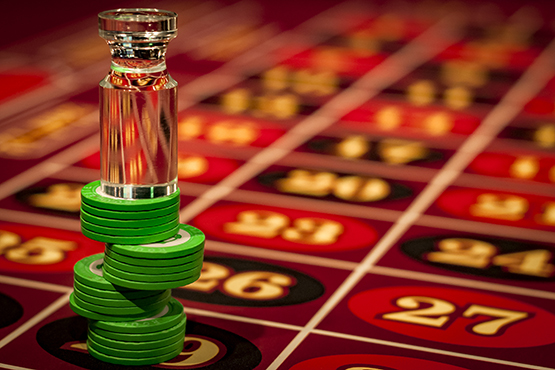 Roulette dolly on top of green chips