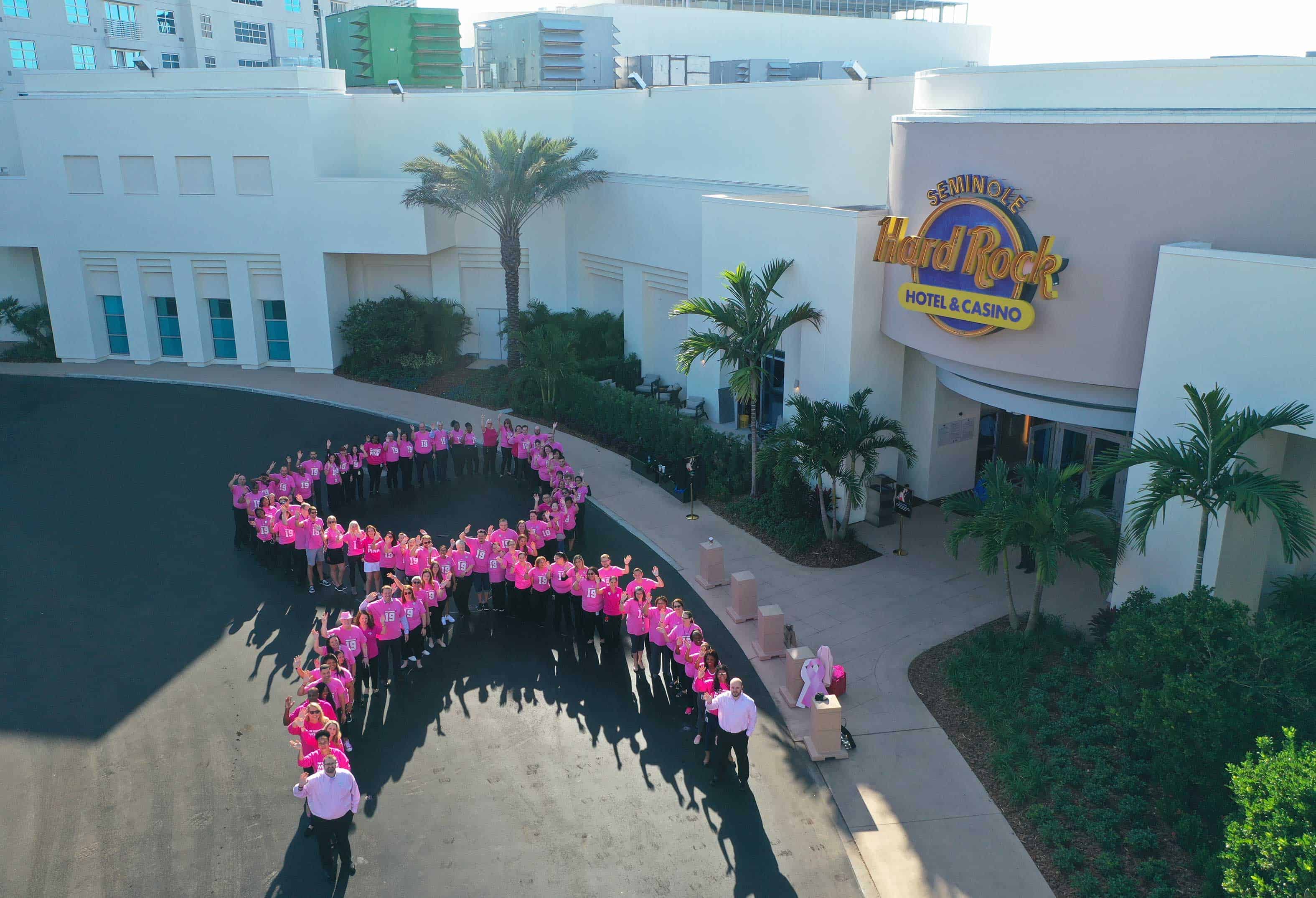 Seminole Hard Rock Tampa team members pink ribbon. 